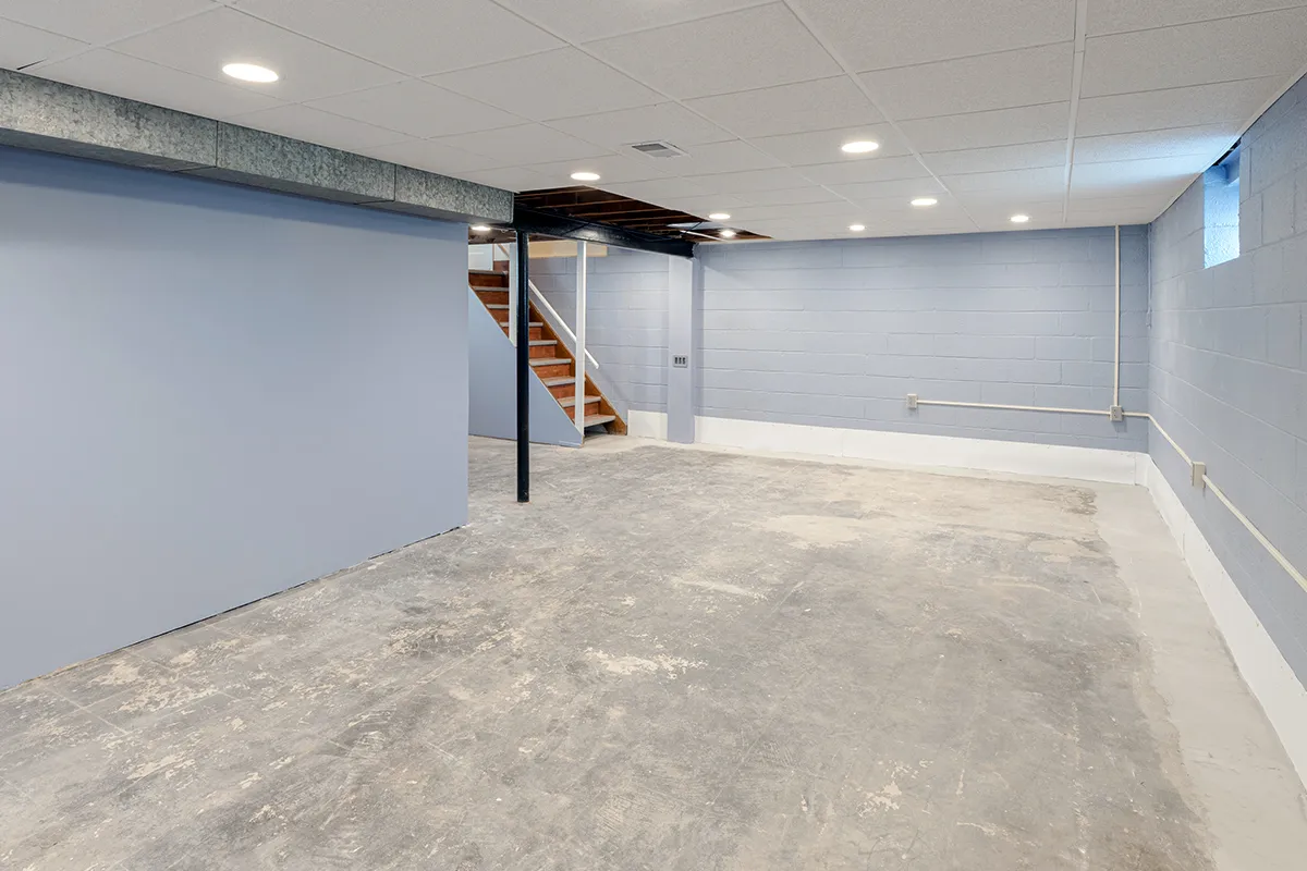 empty basement showing concrete repair and replacement